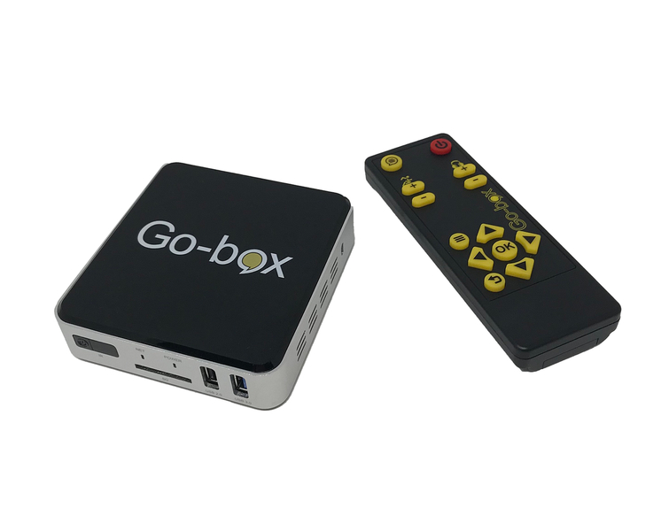 Billede af Go-box enhed placeret ved siden af sin fjernbetjening