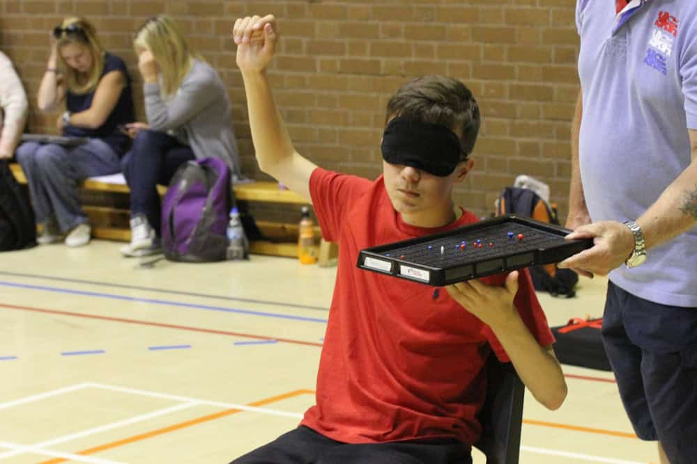 Billede af Boccia Spilgrid med person som markerer med armen