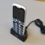 Billede af MiniVision 2 Plus Mobiltelefon Placeret i Opladerstation inklusive USB C kabel